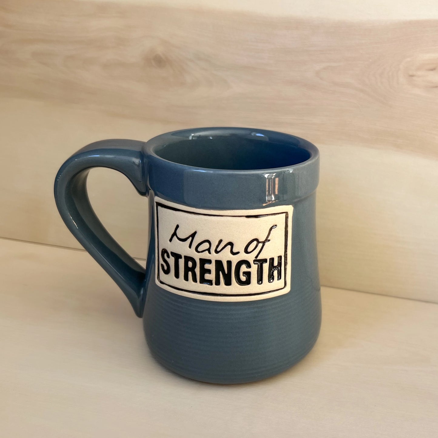 Man of Strength Pottery Mug